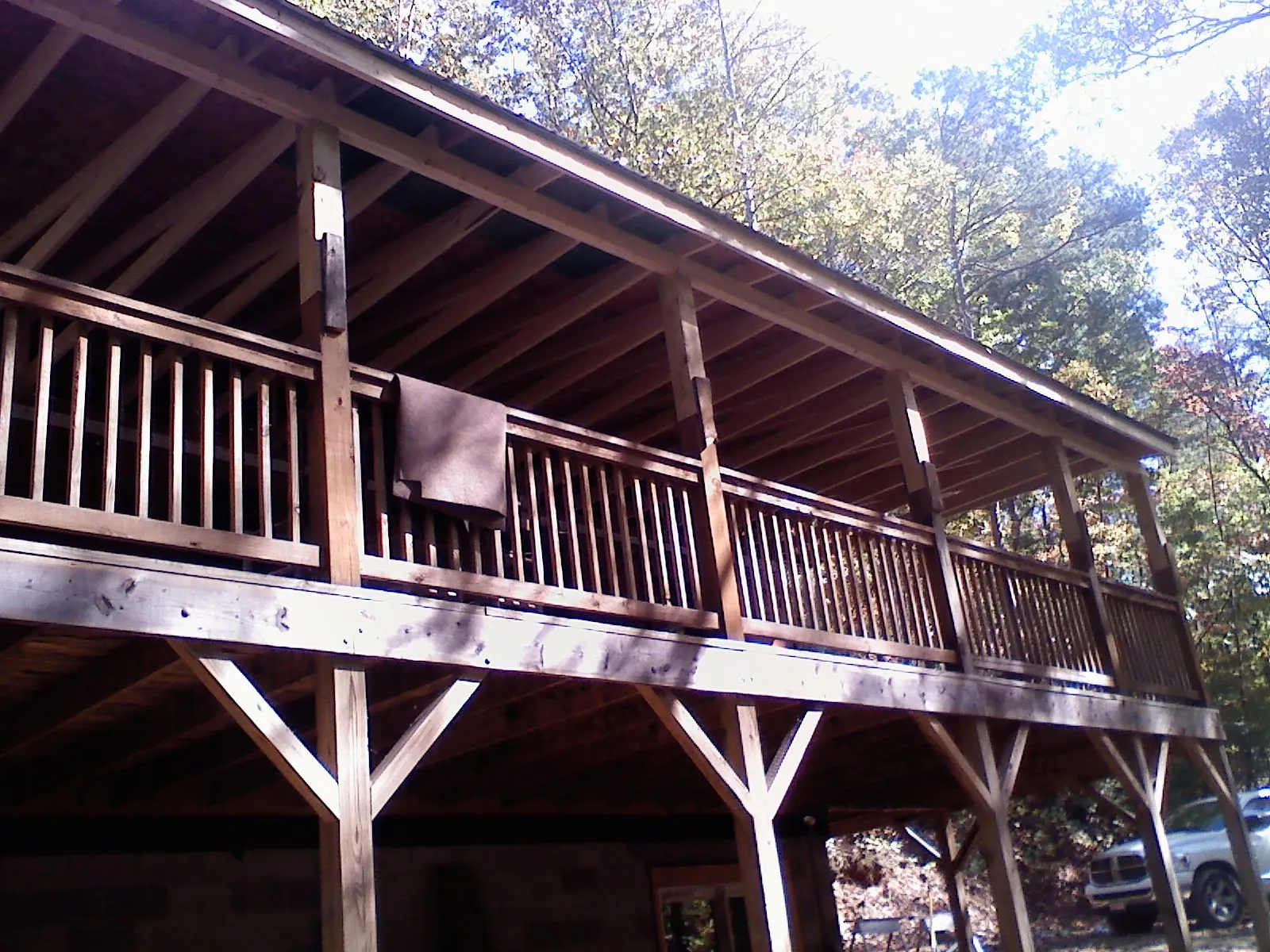 Timber framing under a new elevated porch and deck — Roof Leak Repair in Byron Center by Roofing Brothers